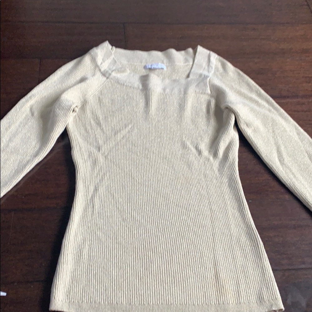 gold sweater